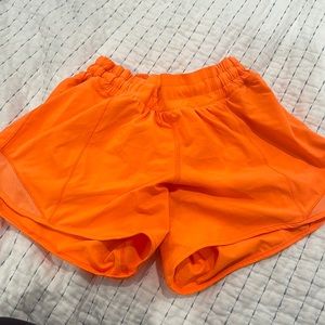 Lulu lemon, size 6 Tall shorts, orange, worn once
